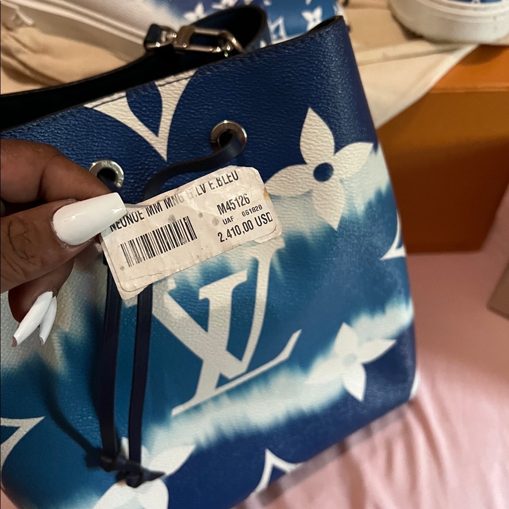 Matching Louis Vuitton bag and sneakers